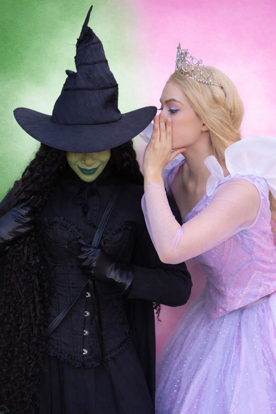 Green witch and good witch storybook characters whispering
